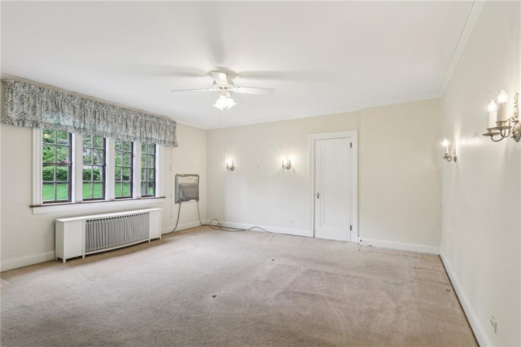 634 West Waldheim Road Pittsburgh, PA 15215 - Photo 26 of 50 an empty room with windows and fan