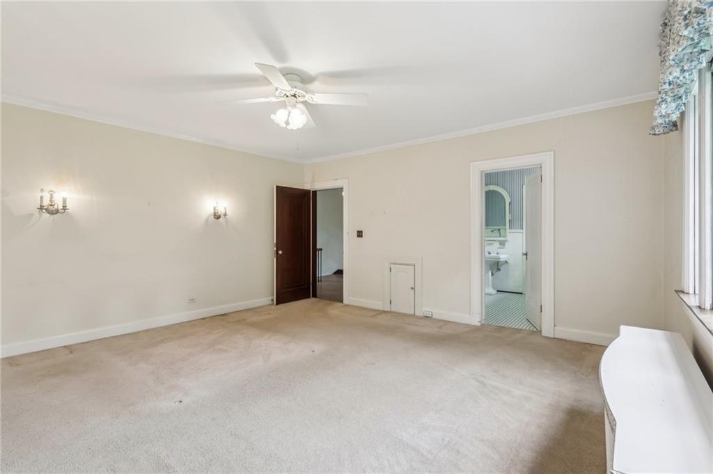 634 West Waldheim Road Pittsburgh, PA 15215 - Photo 27 of 50 an empty room with closet and fan
