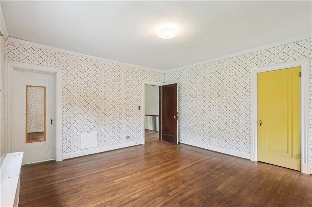 634 West Waldheim Road Pittsburgh, PA 15215 - Photo 31 of 50 an empty room with wooden floor and windows