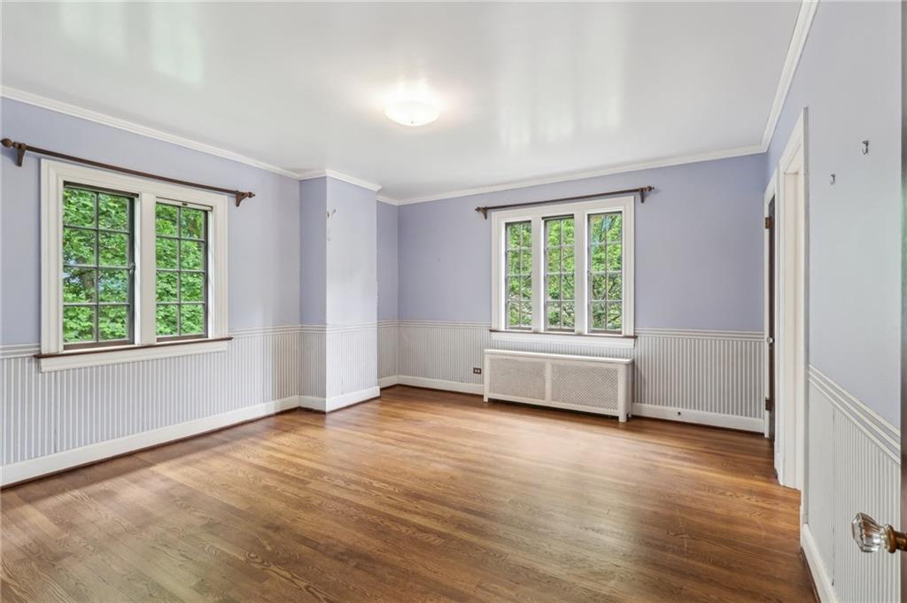 634 West Waldheim Road Pittsburgh, PA 15215 - Photo 34 of 50 a view of an empty room with wooden floor and a window