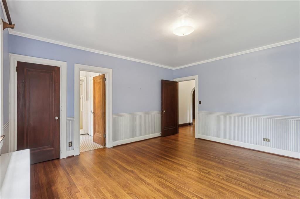 634 West Waldheim Road Pittsburgh, PA 15215 - Photo 35 of 50 a view of an empty room with wooden floor