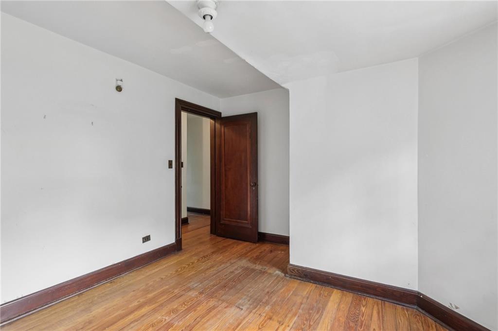 634 West Waldheim Road Pittsburgh, PA 15215 - Photo 37 of 50 a view of an empty room with wooden floor