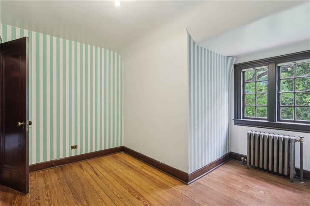 634 West Waldheim Road Pittsburgh, PA 15215 - Photo 38 of 50 a view of a room with wooden floor and windows