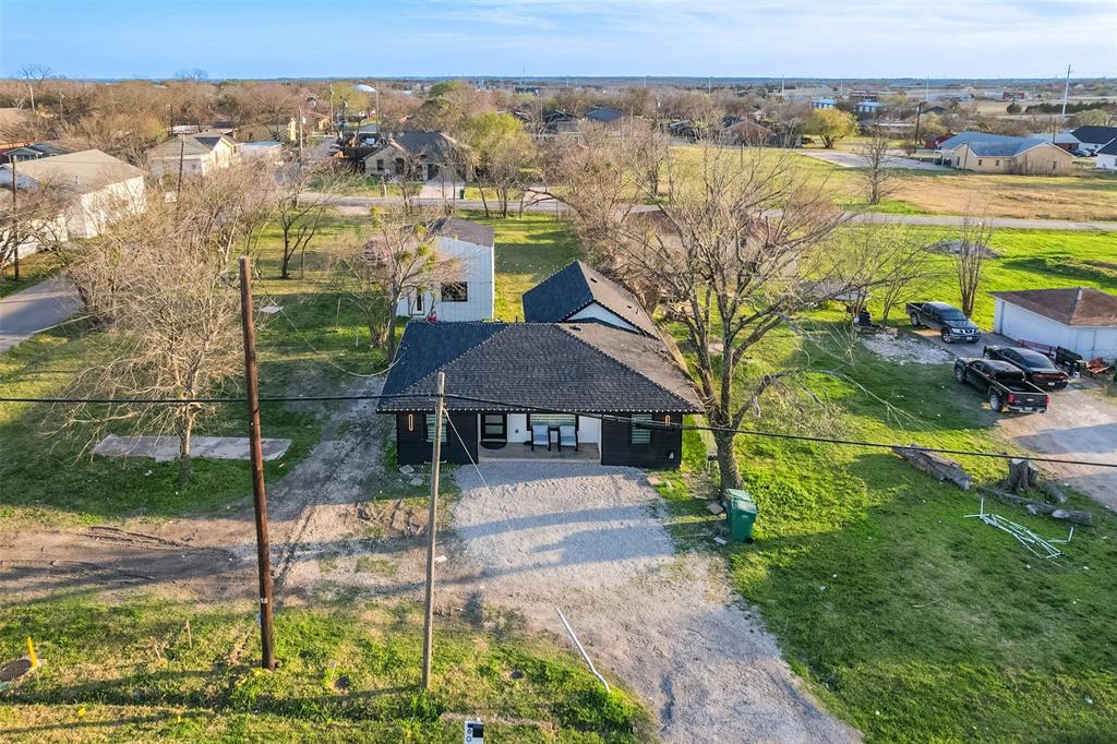602 Ferris Road Ferris, TX 75125 - Photo 1 of 1 FRONT OF HOME FROM AERIAL. APPROXIMATLY 5300 square foot lot. SEE PLAT IN TRANS DESK.