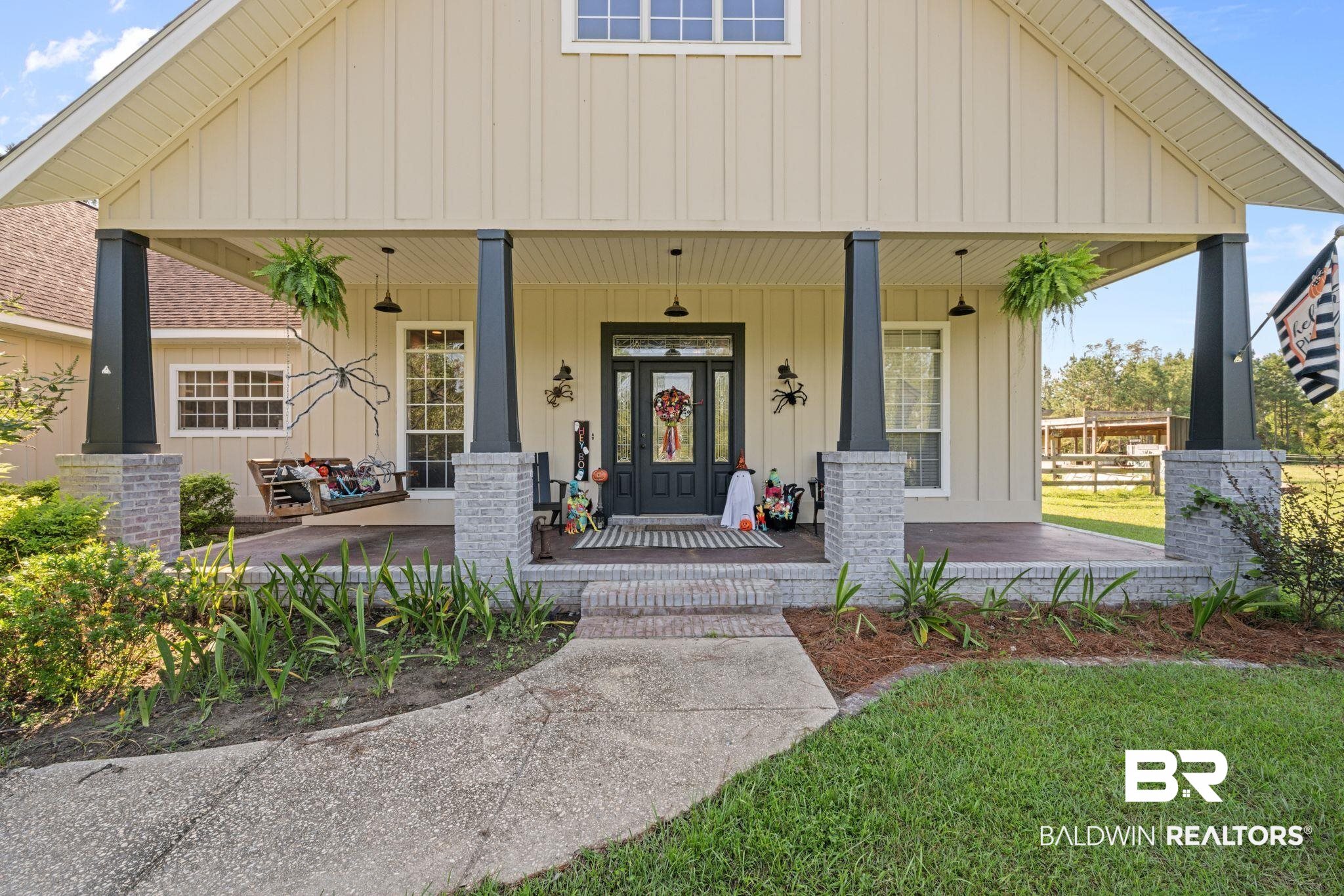 15635 North A N Brady Road Bay Minette, AL 36507 - Photo 4 of 51 View of front of property featuring a porch