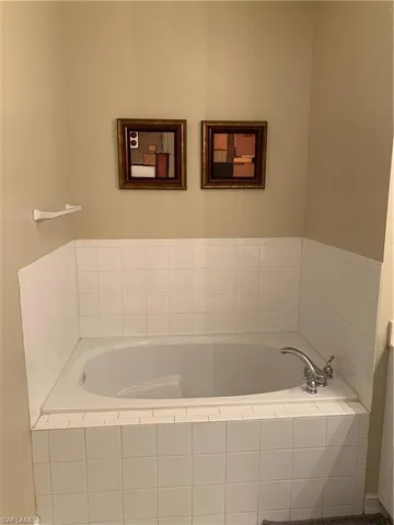 a bathroom with bathtub