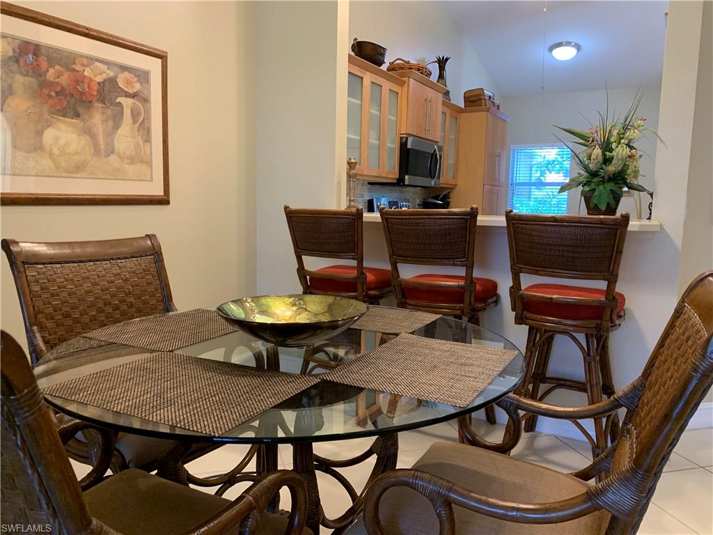 8133 Chancel Court, Unit 641 Naples, FL 34104 - Photo 4 of 25 a view of a workspace with furniture