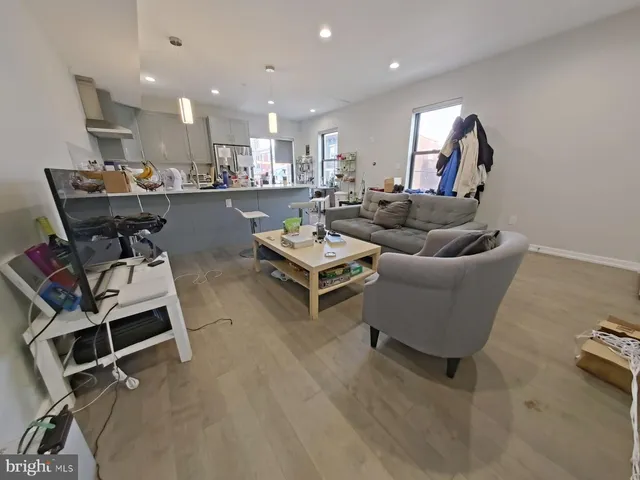 a bed room with a bed and a tv