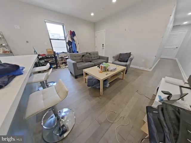 a bathroom with a sink a toilet and a bathtub