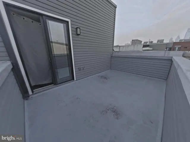 a view of a brick house with a door