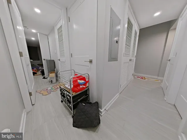 a bed room with a bed and a desk