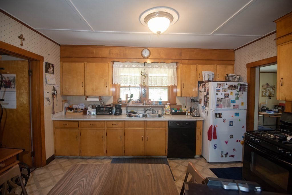 120 Adams Street Barre, MA 01005 - Photo 16 of 42 a kitchen with stainless steel appliances granite countertop a stove and refrigerator