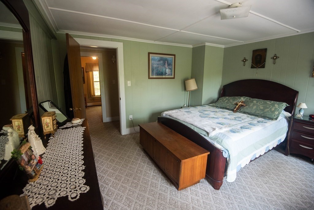 120 Adams Street Barre, MA 01005 - Photo 22 of 42 a bedroom with bed and a night stand