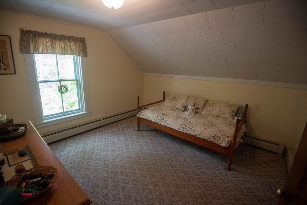 120 Adams Street Barre, MA 01005 - Photo 29 of 42 a bedroom with a bed and a window