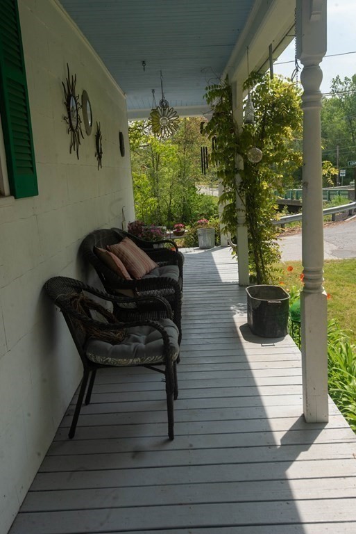 120 Adams Street Barre, MA 01005 - Photo 33 of 42 a bench sitting on top of a wooden floor