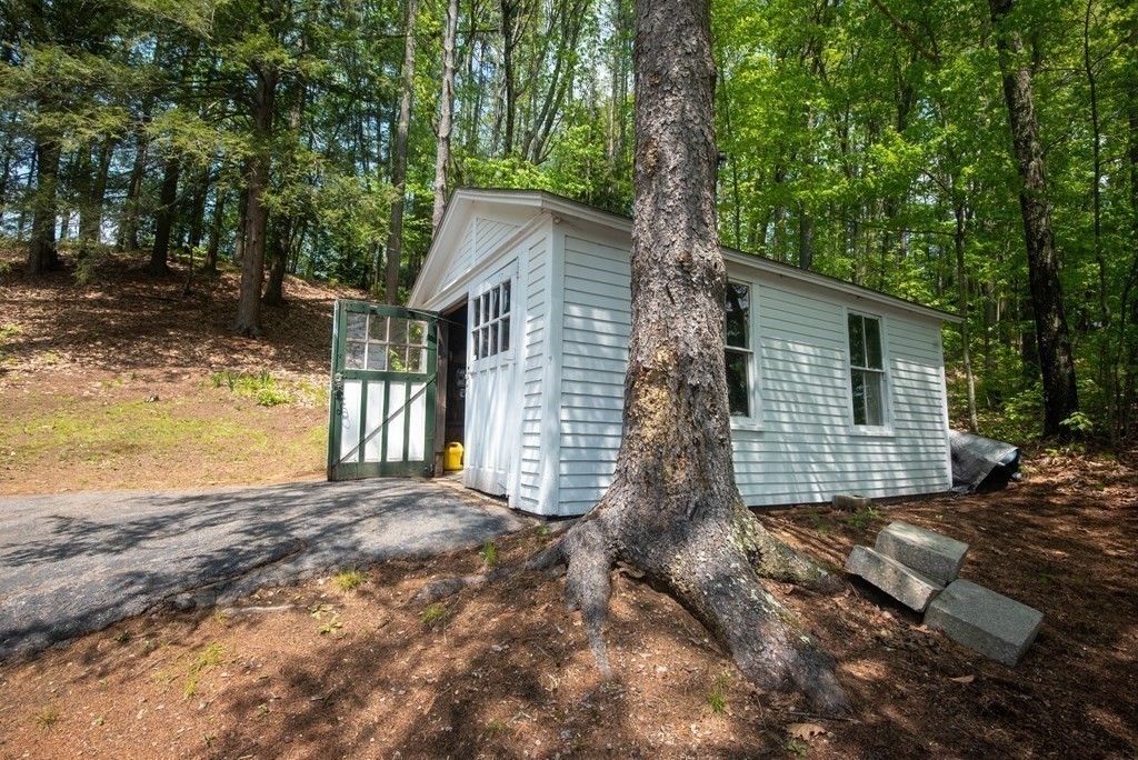 120 Adams Street Barre, MA 01005 - Photo 40 of 42 a view of a house with a small yard and large tree