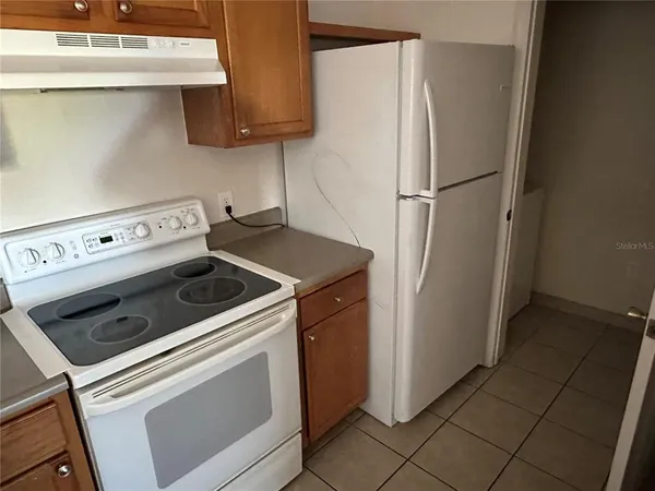 a view of a sink and a mirror