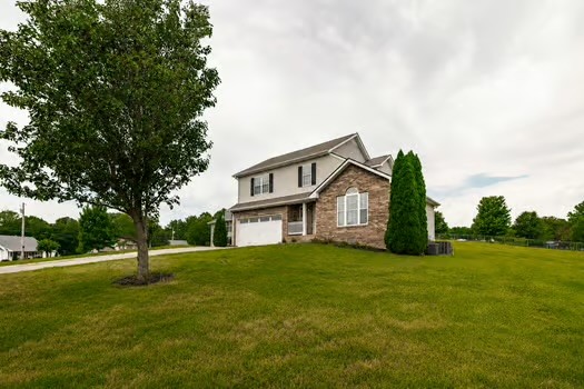2029 Copper Kettle Circle Pleasant View, TN 37146 - Photo 58 of 58 a house with garden in front of it