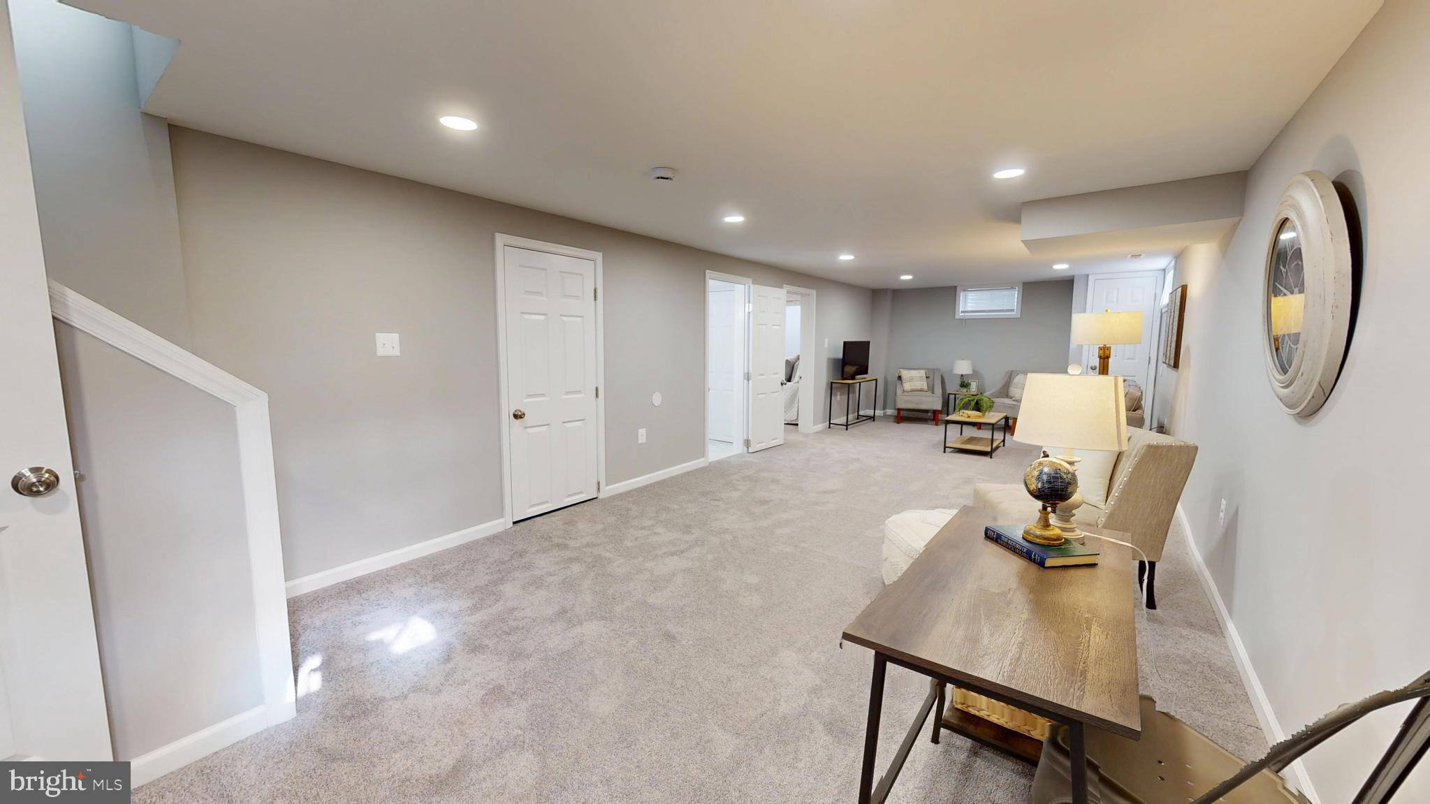 6211 Johnnycake Road Gwynn Oak, MD 21207 - Photo 18 of 26 a view of a living room and a livingroom with furniture