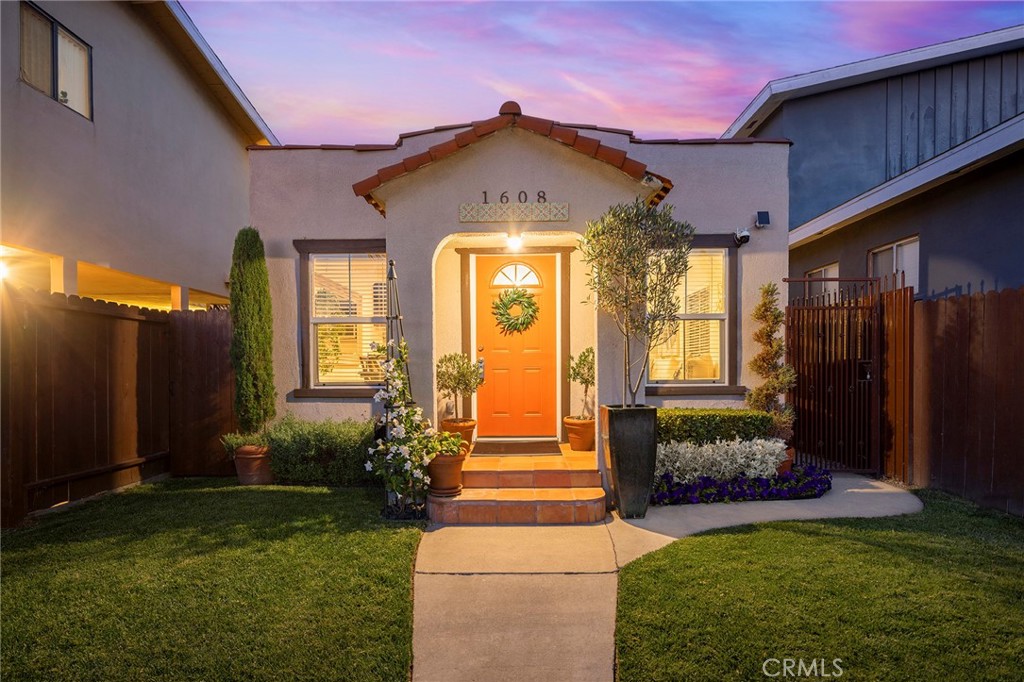 1608 Cedar Avenue Long Beach, CA 90813 - Photo 2 of 45 a front view of a house having yard