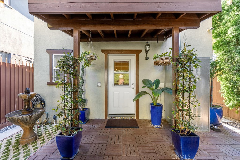1608 Cedar Avenue Long Beach, CA 90813 - Photo 24 of 45 a potted plant sitting in front of a house