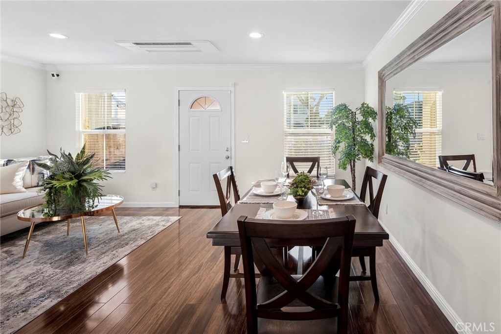 1608 Cedar Avenue Long Beach, CA 90813 - Photo 10 of 45 a view of a dining room with furniture window and wooden floor
