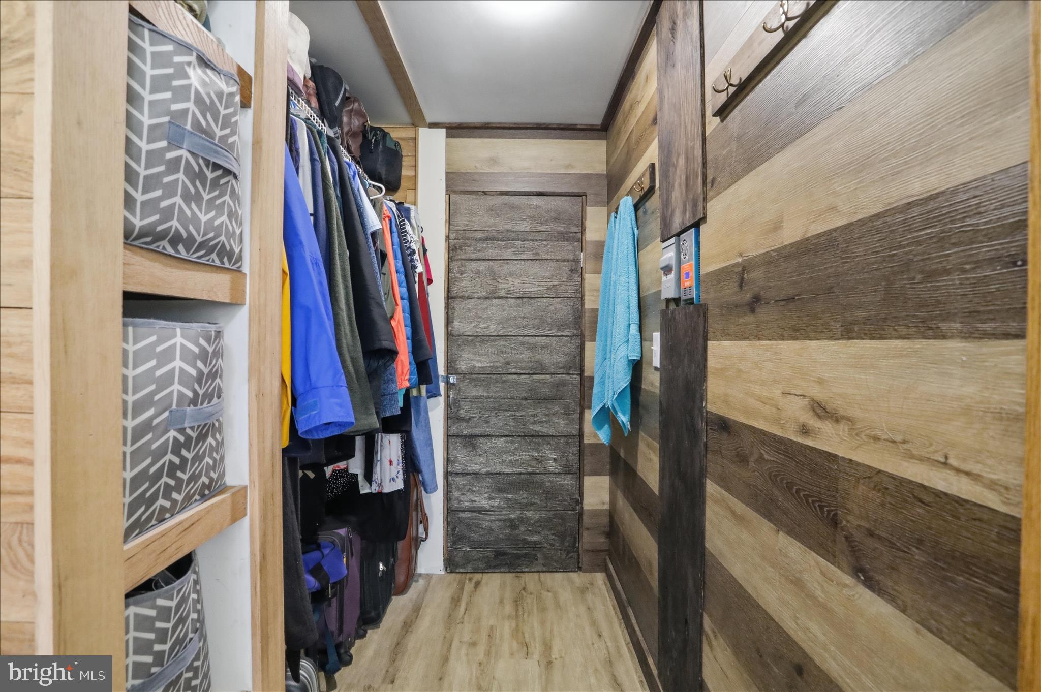 936 Johnny Cake Road Great Cacapon, WV 25422 - Photo 14 of 33 a view of walk in closet with clothes