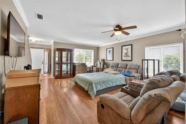 a bathroom with a sink a toilet a mirror and shower