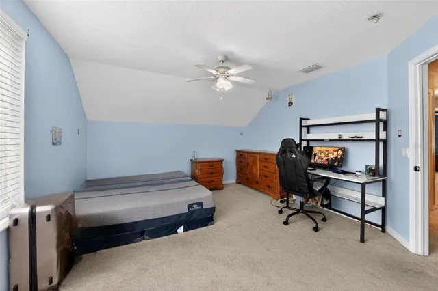 a view of a workspace with furniture