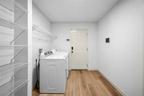 a utility room with dryer and washer