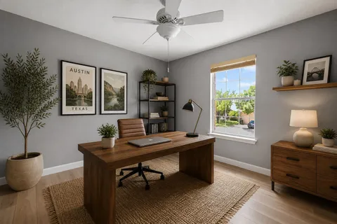 a work room with furniture and a window
