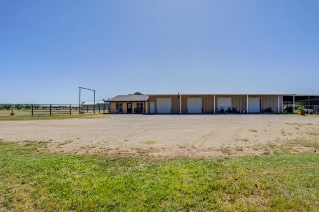 a dining room with furniture and a fireplace