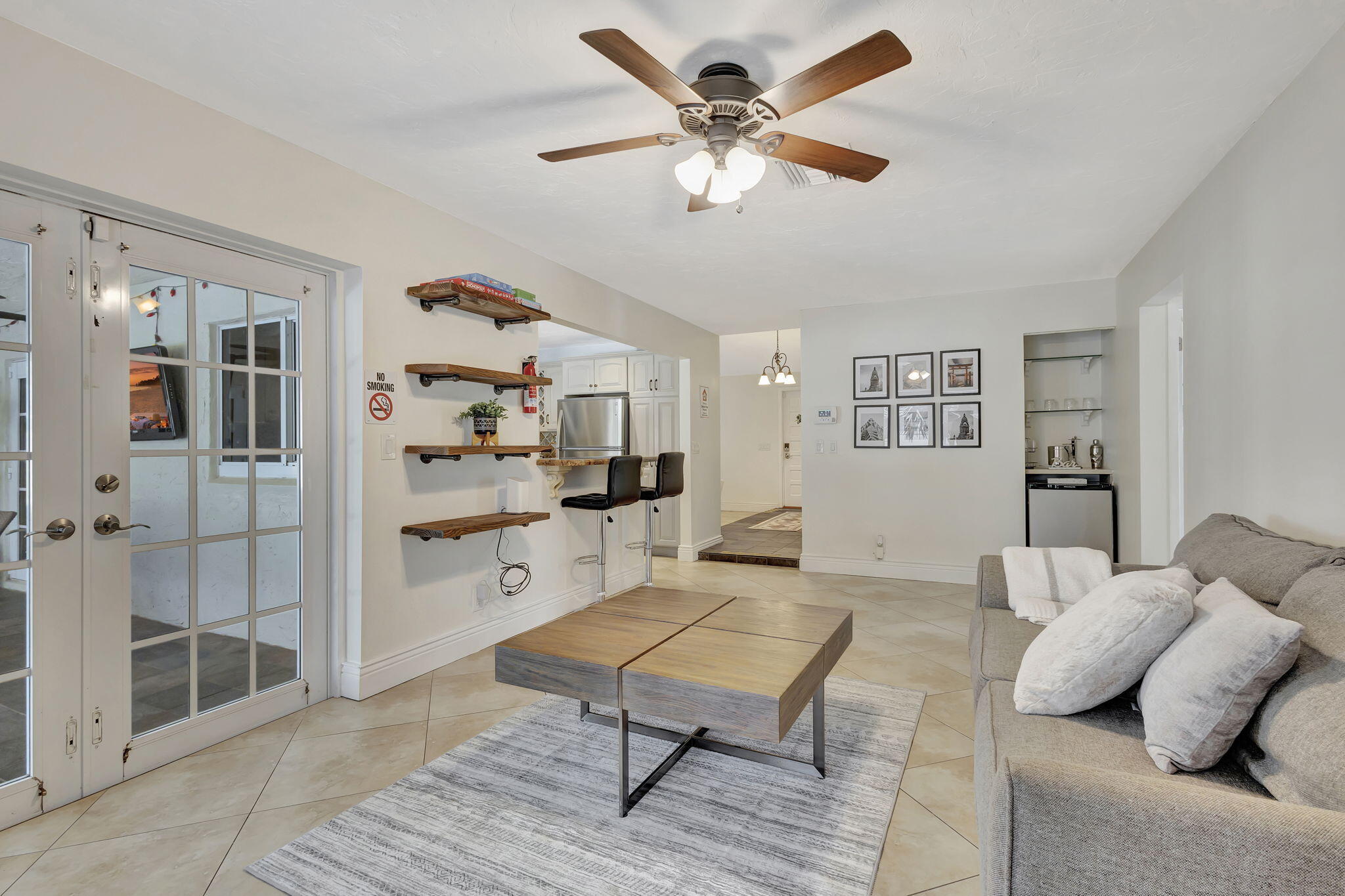 1104 Jackpine Street Wellington, FL 33414 - Photo 20 of 67 a living room with furniture and view of kitchen