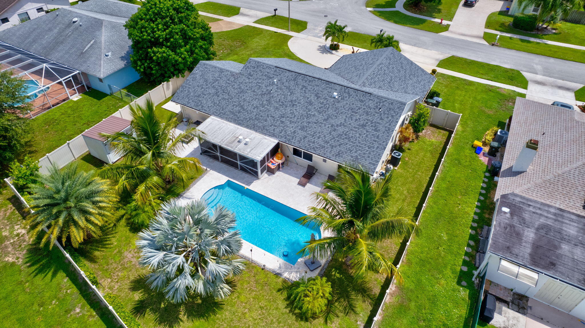 1104 Jackpine Street Wellington, FL 33414 - Photo 65 of 67 an aerial view of houses with yard