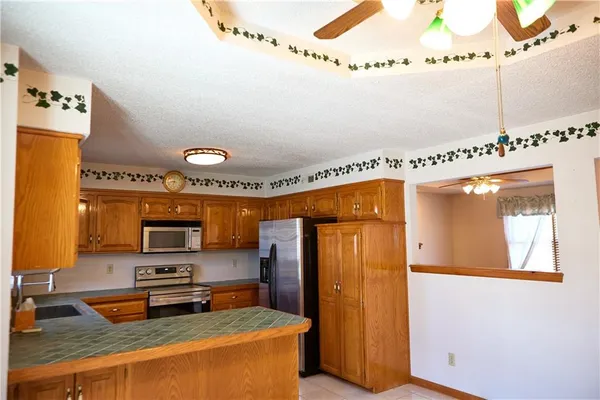 $310,000 | 616 Northeast Michael Drive, Lee's Summit, MO 64086