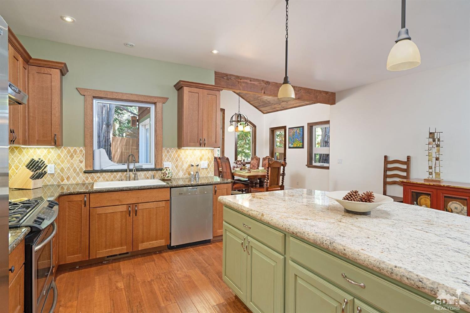 24838 Fern Valley Road Idyllwild, CA 92549 - Photo 11 of 38 a kitchen with sink and window