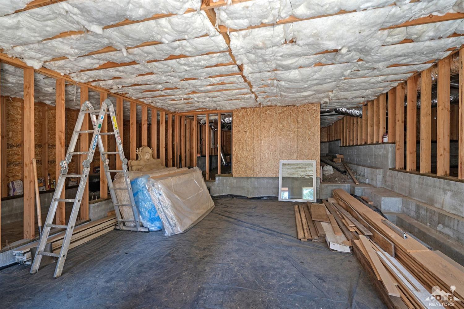24838 Fern Valley Road Idyllwild, CA 92549 - Photo 33 of 38 a view of an empty room with wooden floor