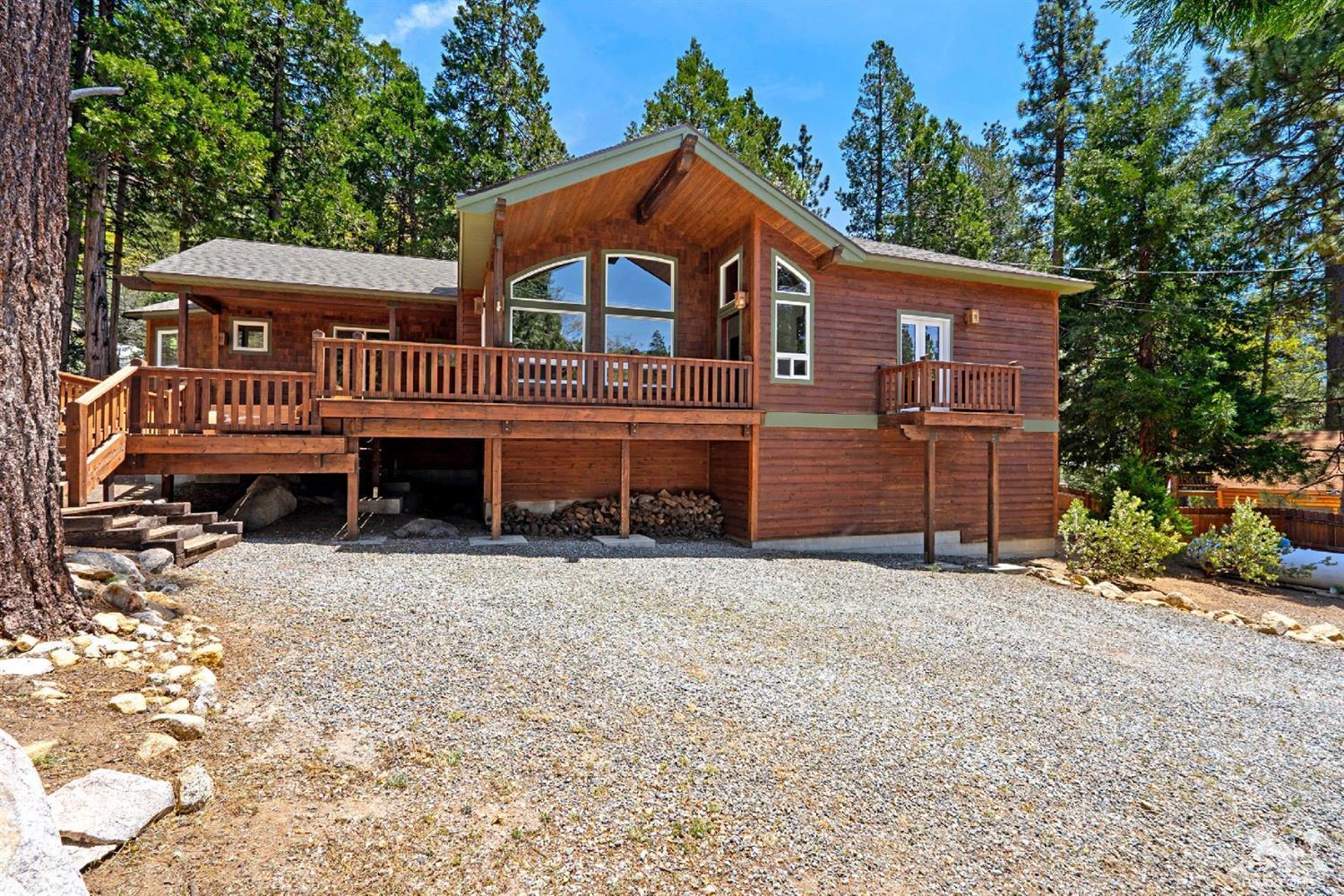 24838 Fern Valley Road Idyllwild, CA 92549 - Photo 38 of 38 a front view of a house with a yard