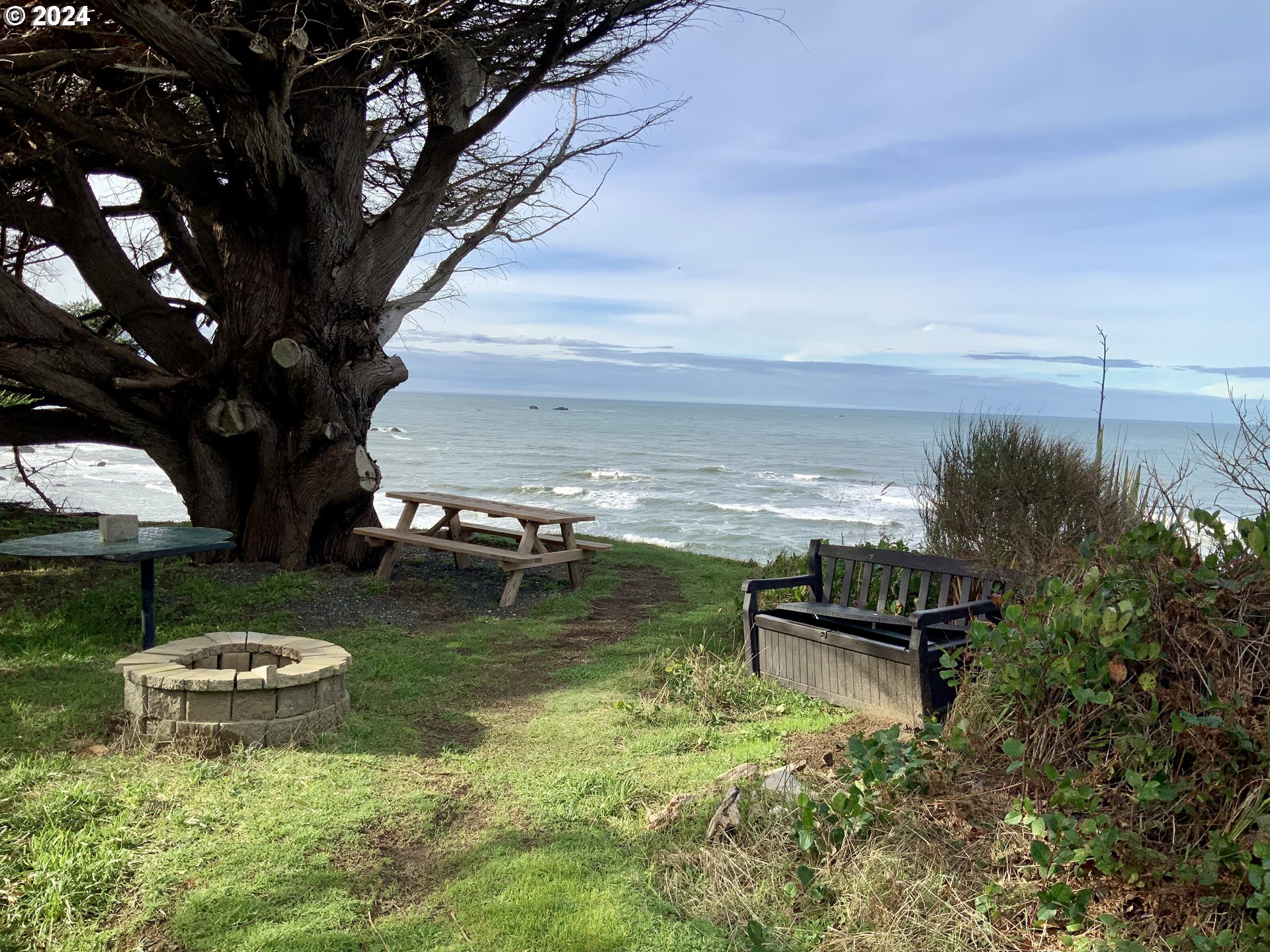 0 Surfside Drive, Unit 1101 Gold Beach, OR 97444 - Photo 11 of 19 a view of a garden with an outdoor space