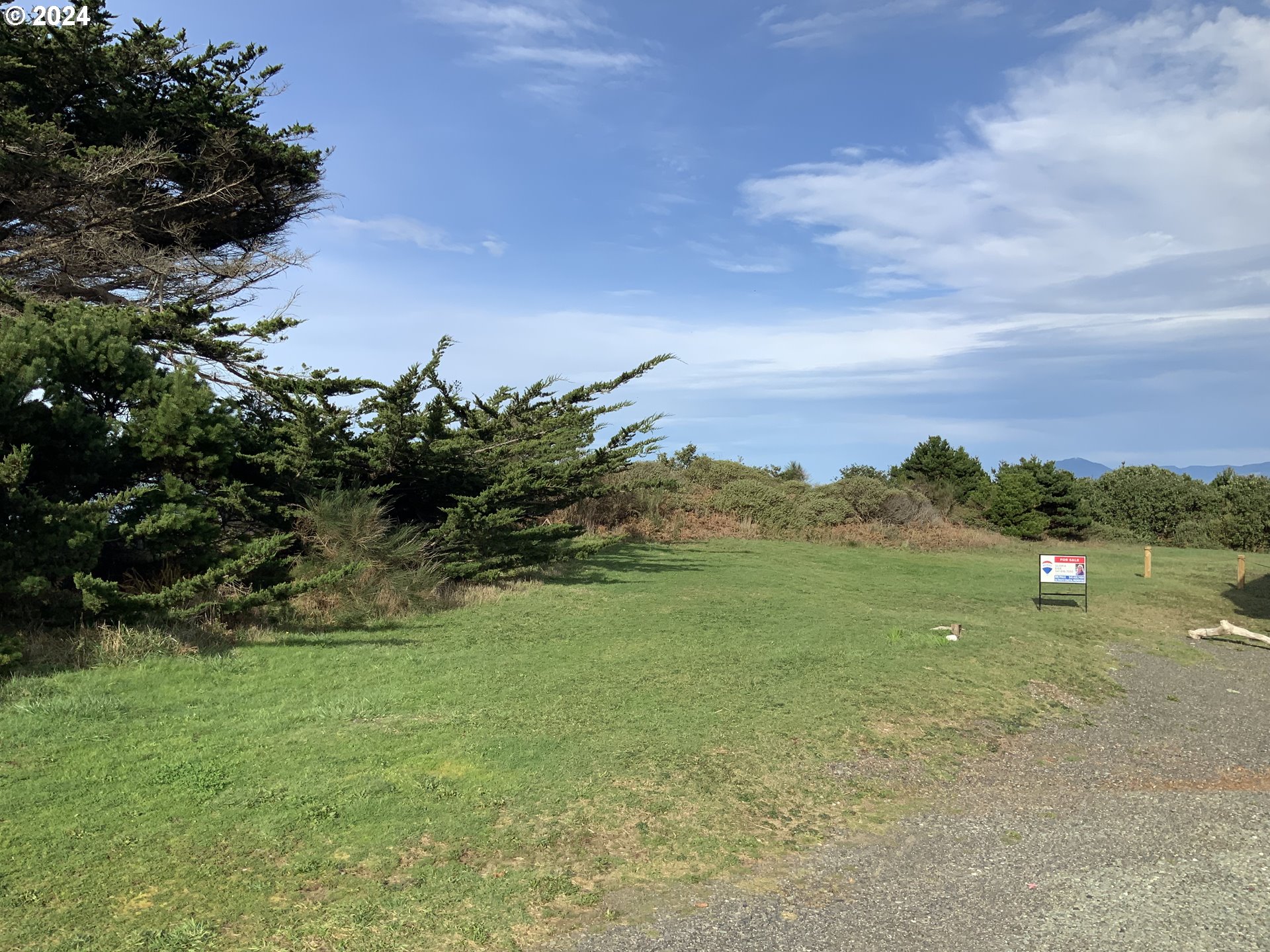 0 Surfside Drive, Unit 1101 Gold Beach, OR 97444 - Photo 7 of 19 a view of a lake with a mountain