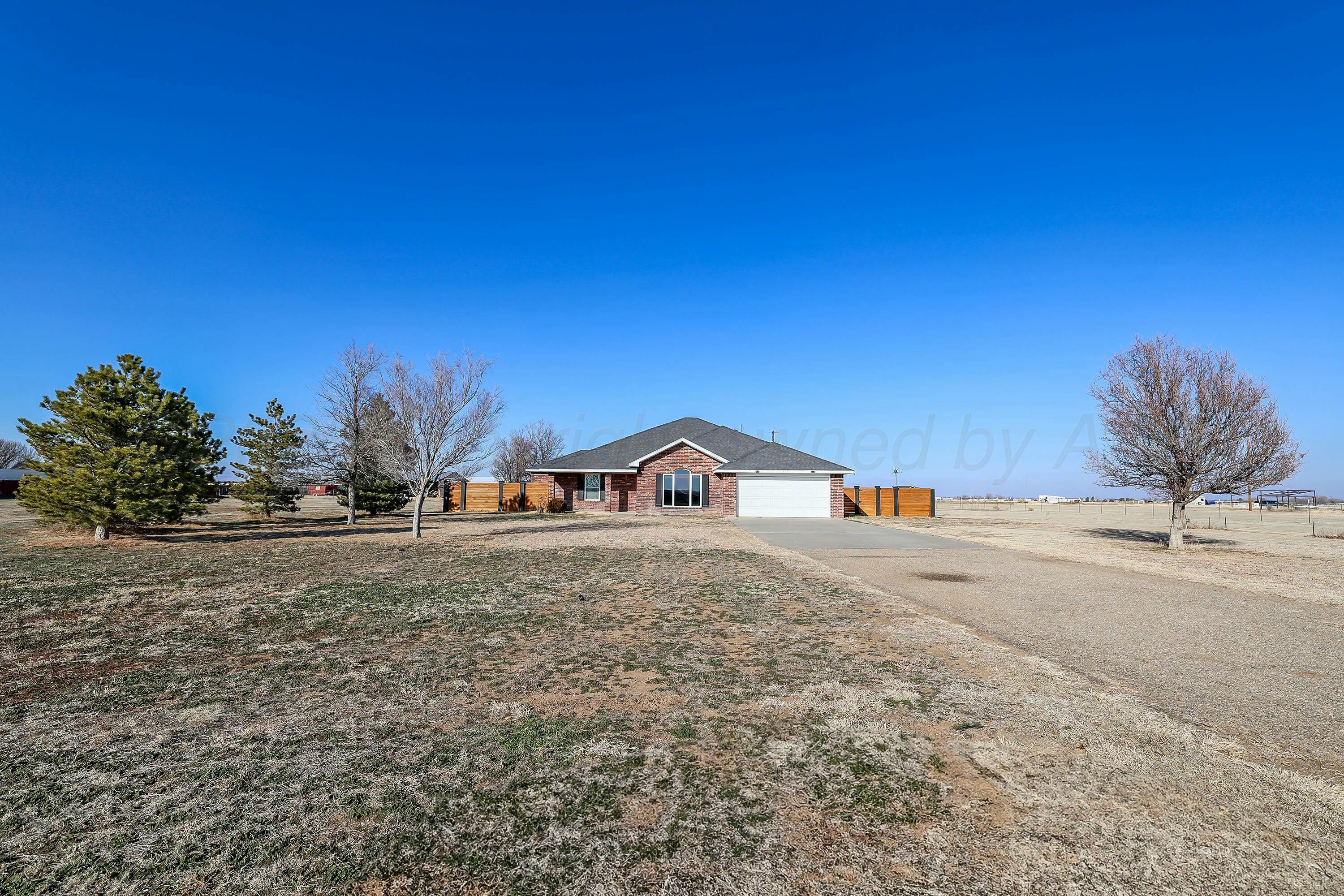 800 West McAfee Road Amarillo, TX 79118 - Photo 2 of 39 a view of a outdoor space with trees