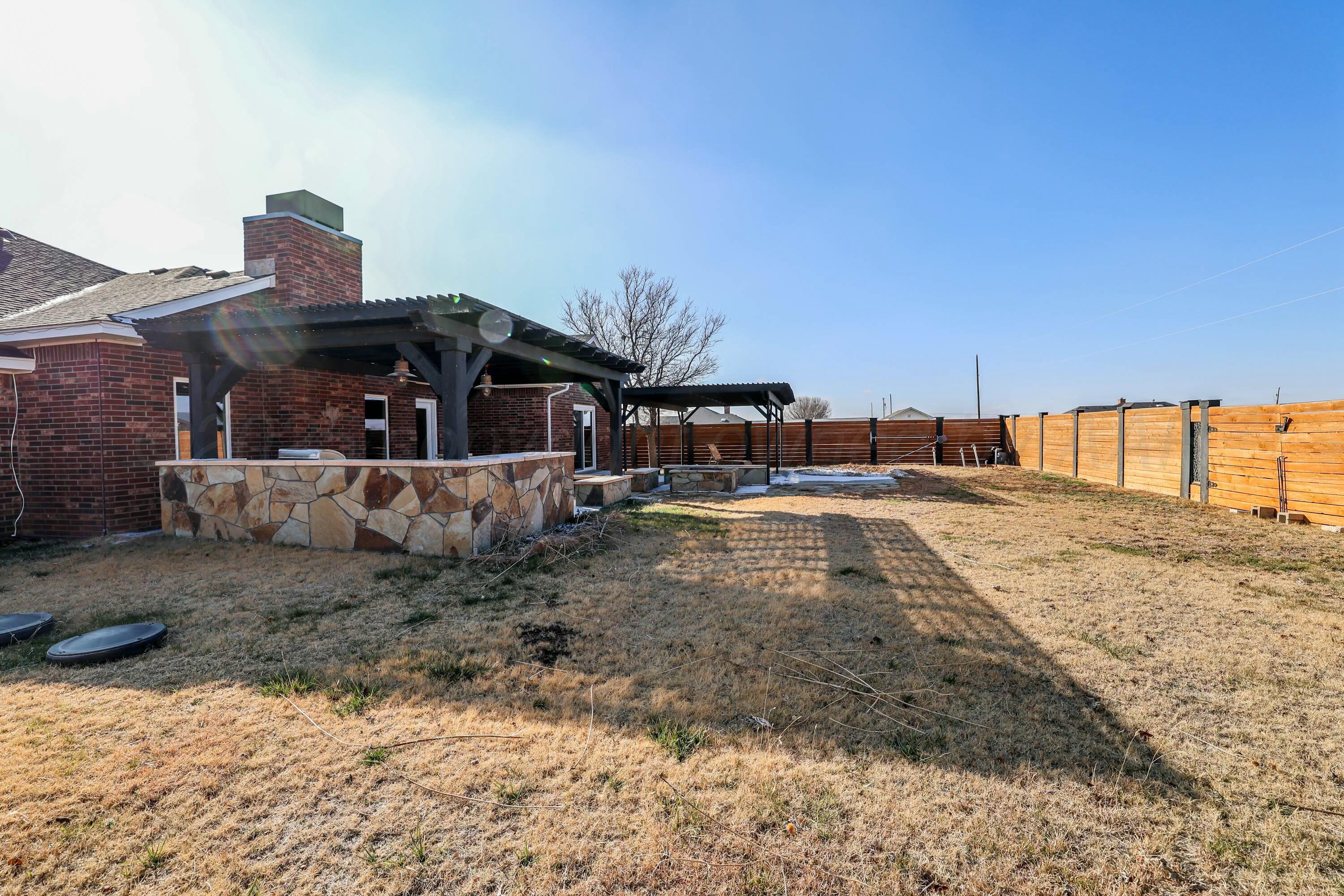 800 West McAfee Road Amarillo, TX 79118 - Photo 36 of 39 a view of a house with a yard