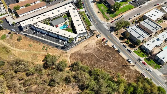 a view of a yard with an outdoor seating