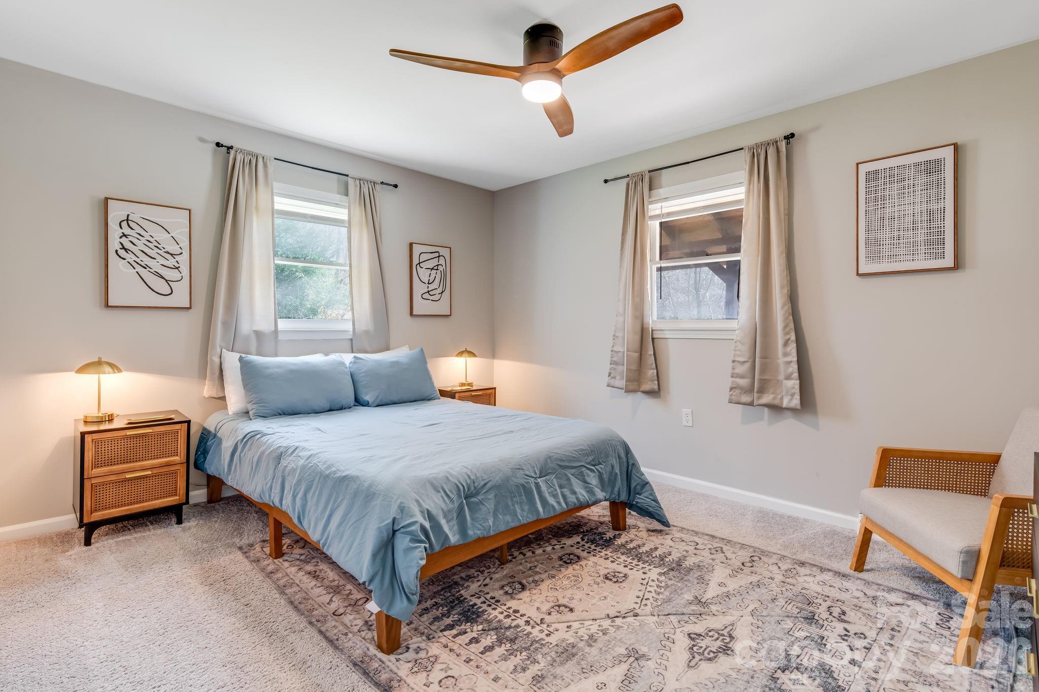 114 Johns Creek Road Canton, NC 28716 - Photo 16 of 48 a bedroom with a bed and window