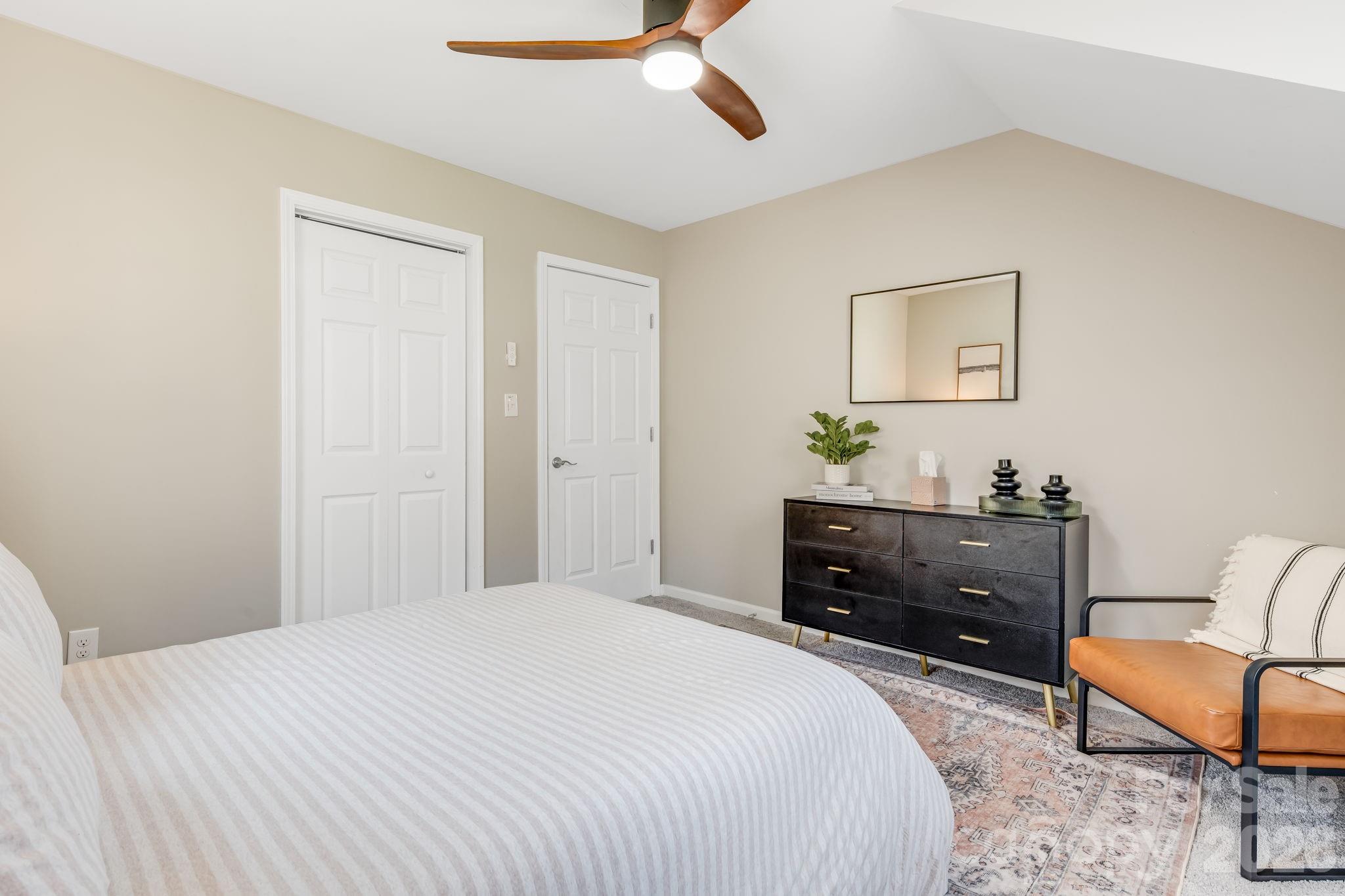 114 Johns Creek Road Canton, NC 28716 - Photo 22 of 48 a bedroom with a bed and a dresser