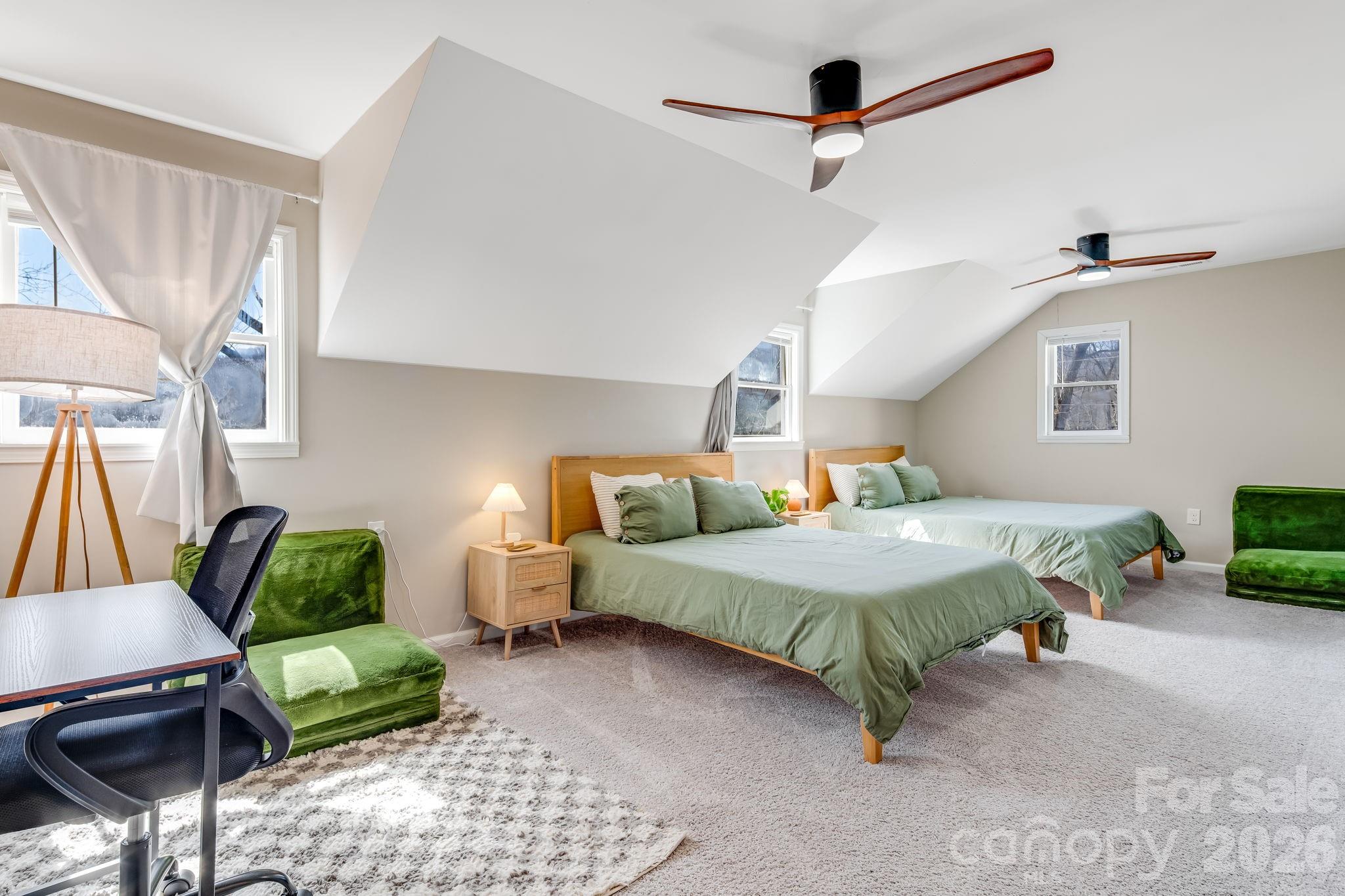 114 Johns Creek Road Canton, NC 28716 - Photo 26 of 48 a bedroom with bed and a couch