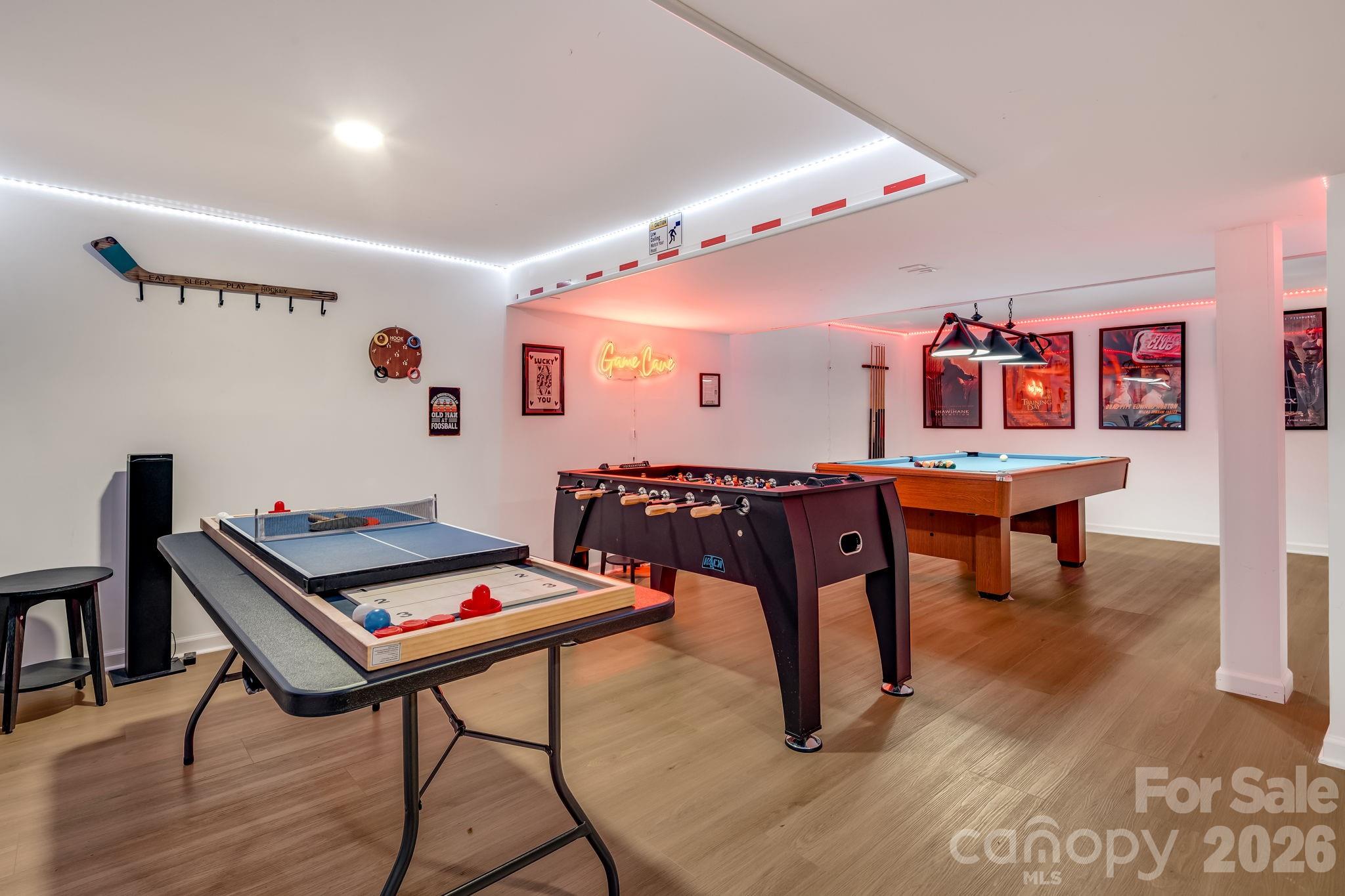 114 Johns Creek Road Canton, NC 28716 - Photo 32 of 48 a room with furniture and air hockey table