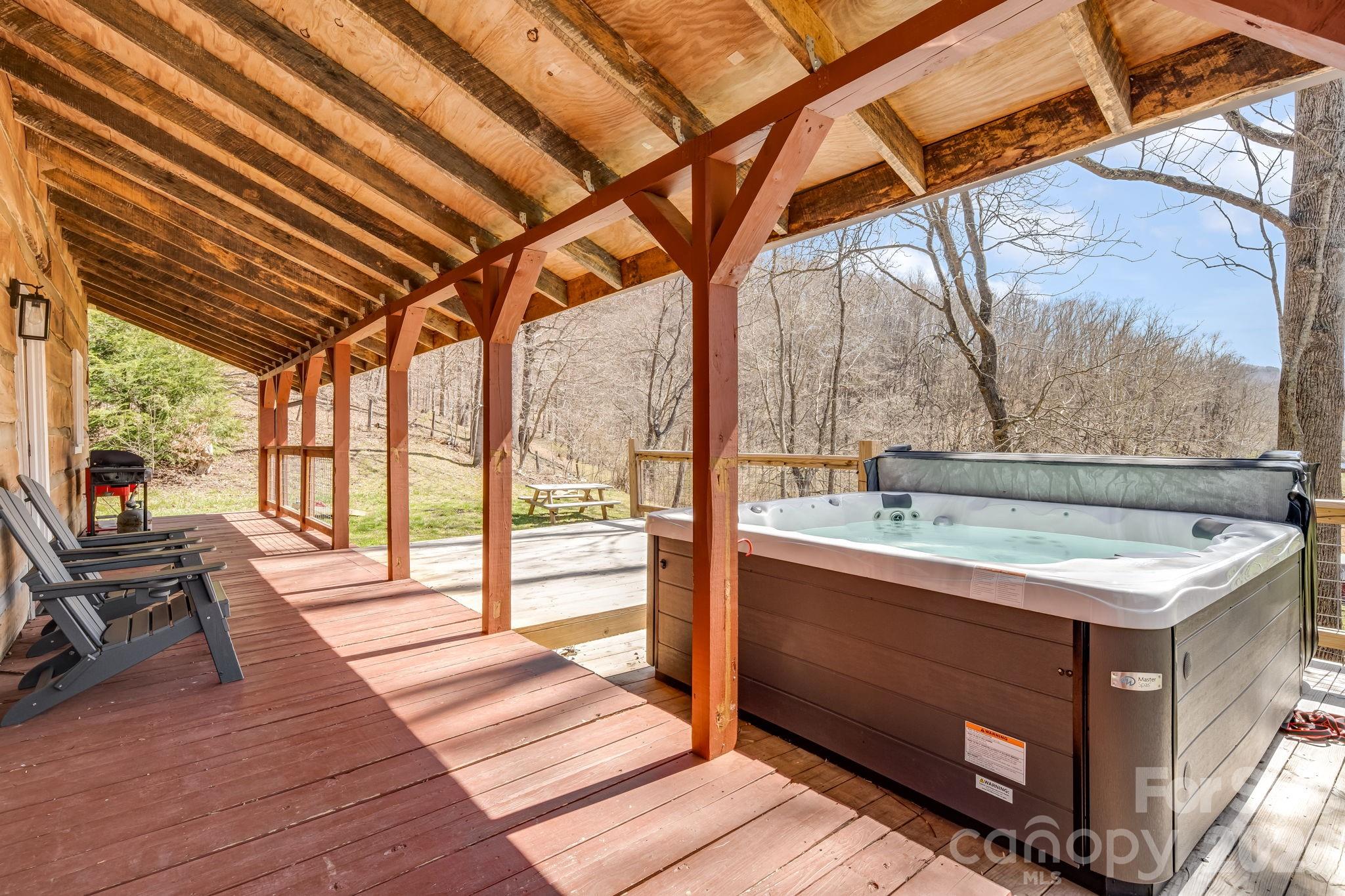 114 Johns Creek Road Canton, NC 28716 - Photo 34 of 48 a view of a kitchen with a sink and wooden floor