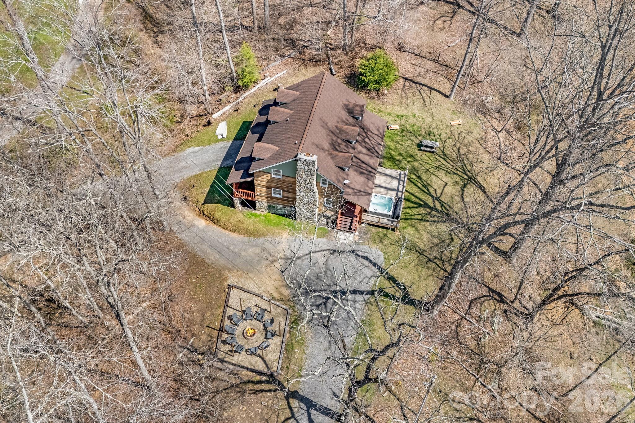 114 Johns Creek Road Canton, NC 28716 - Photo 45 of 48 a aerial view of a house with swimming pool