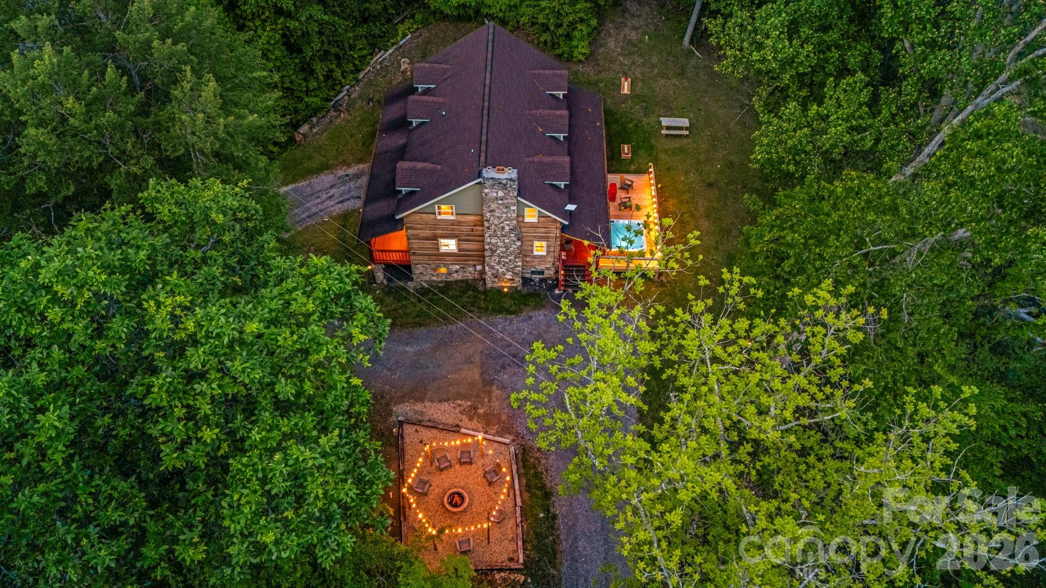 114 Johns Creek Road Canton, NC 28716 - Photo 46 of 48 an aerial view of a house with a yard basket ball court and outdoor seating